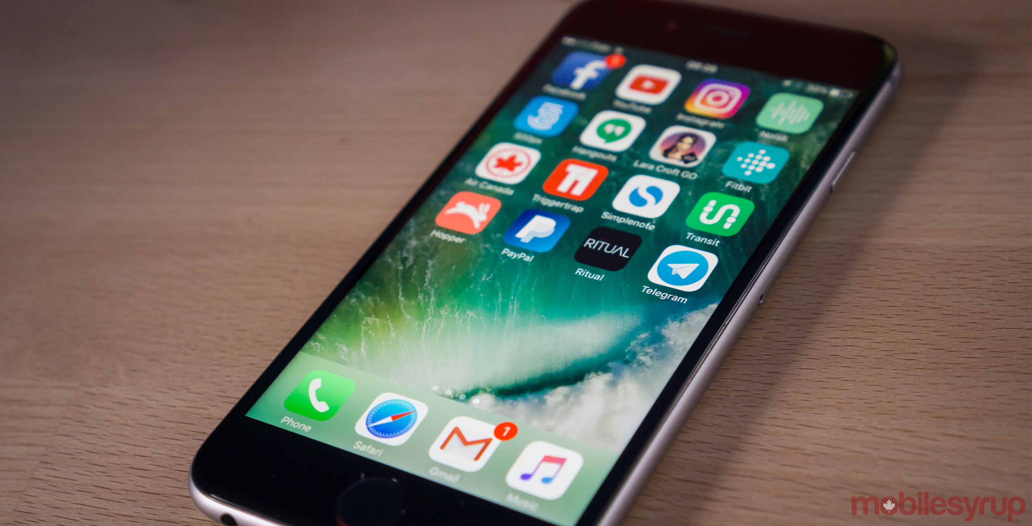 apple smartphone with screen on - third ios 10.3 beta