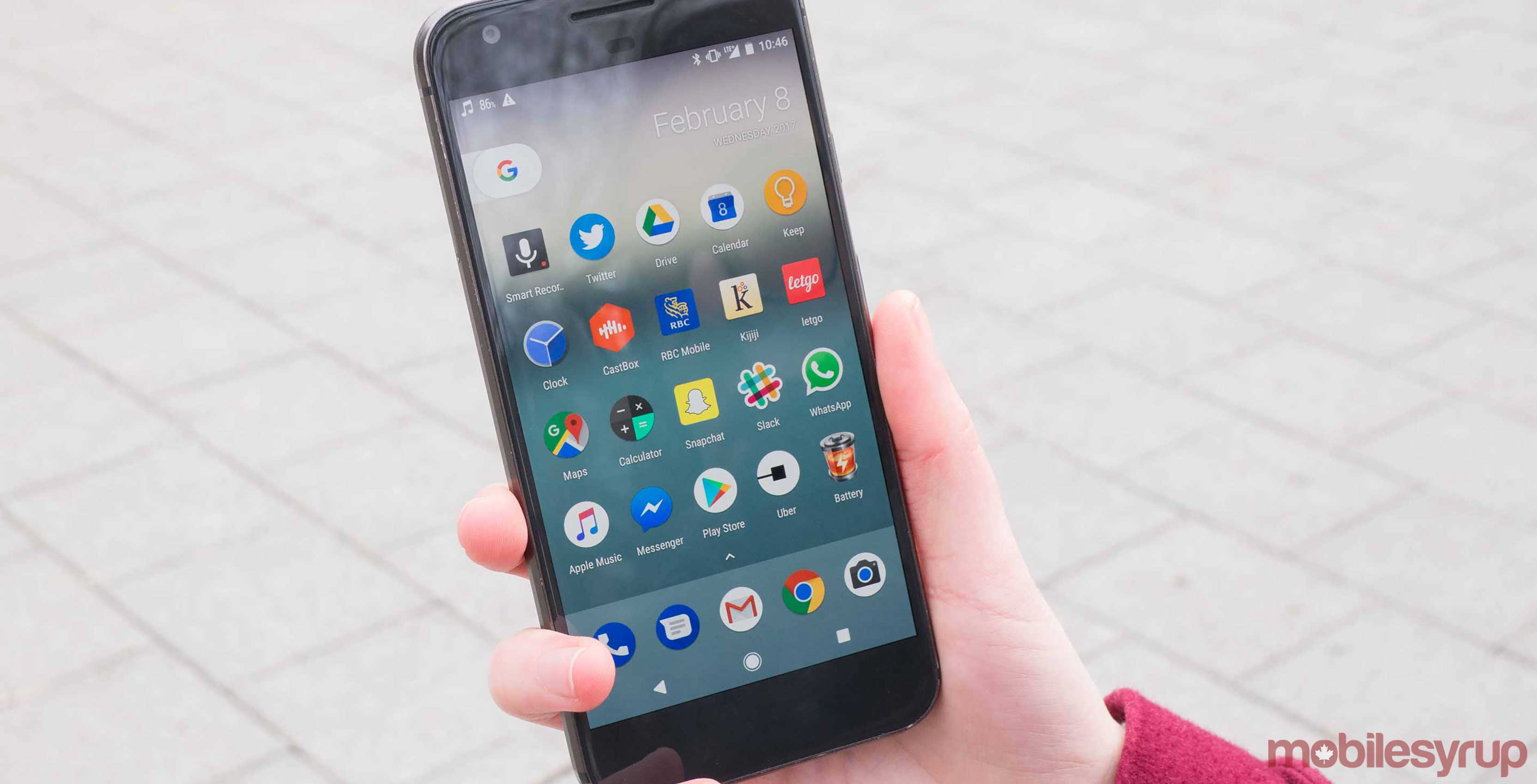 Google Pixel smartphone held in a hand