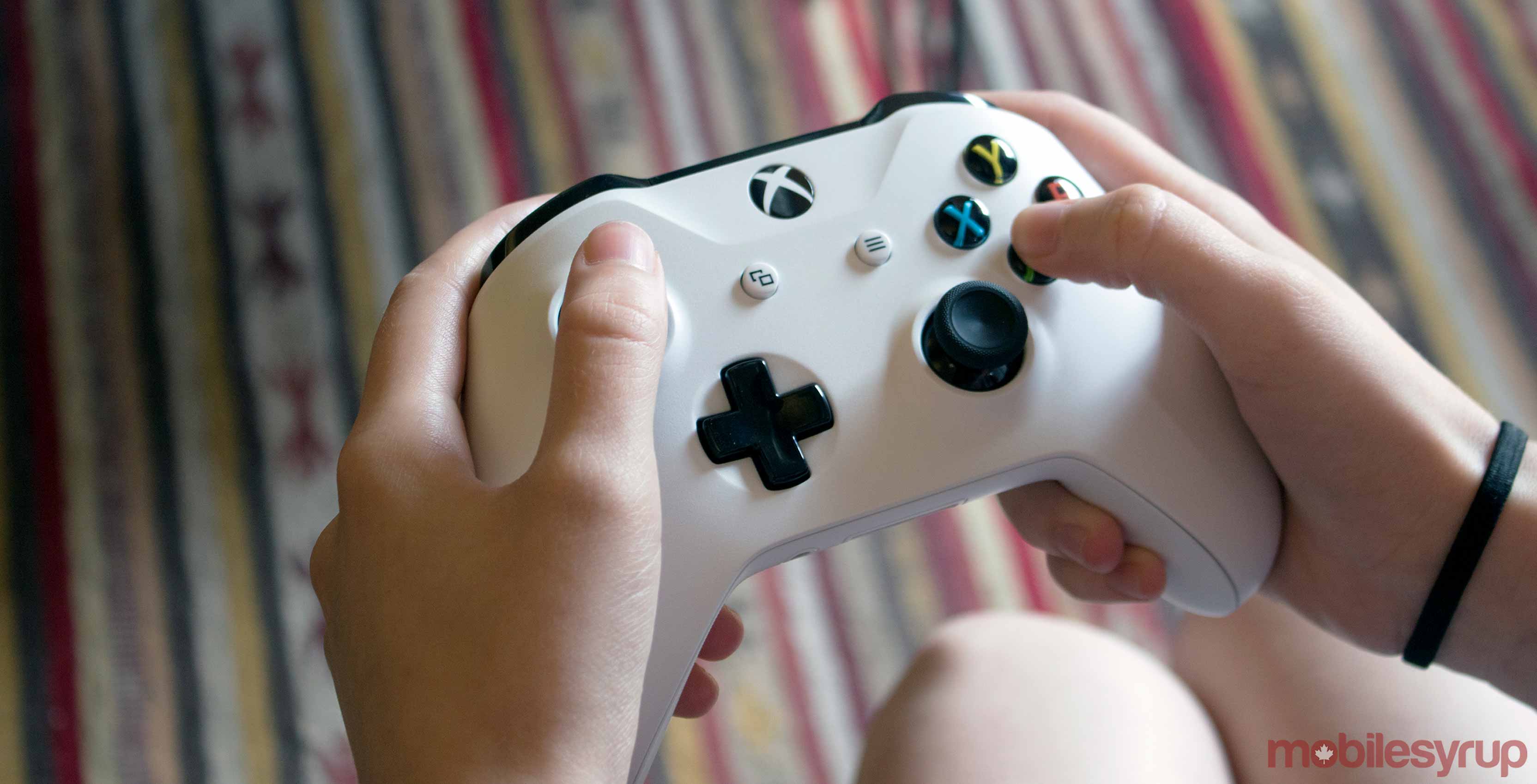 Xbox One white controller in hands