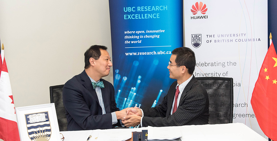 Huawei Canada president with president of UBC