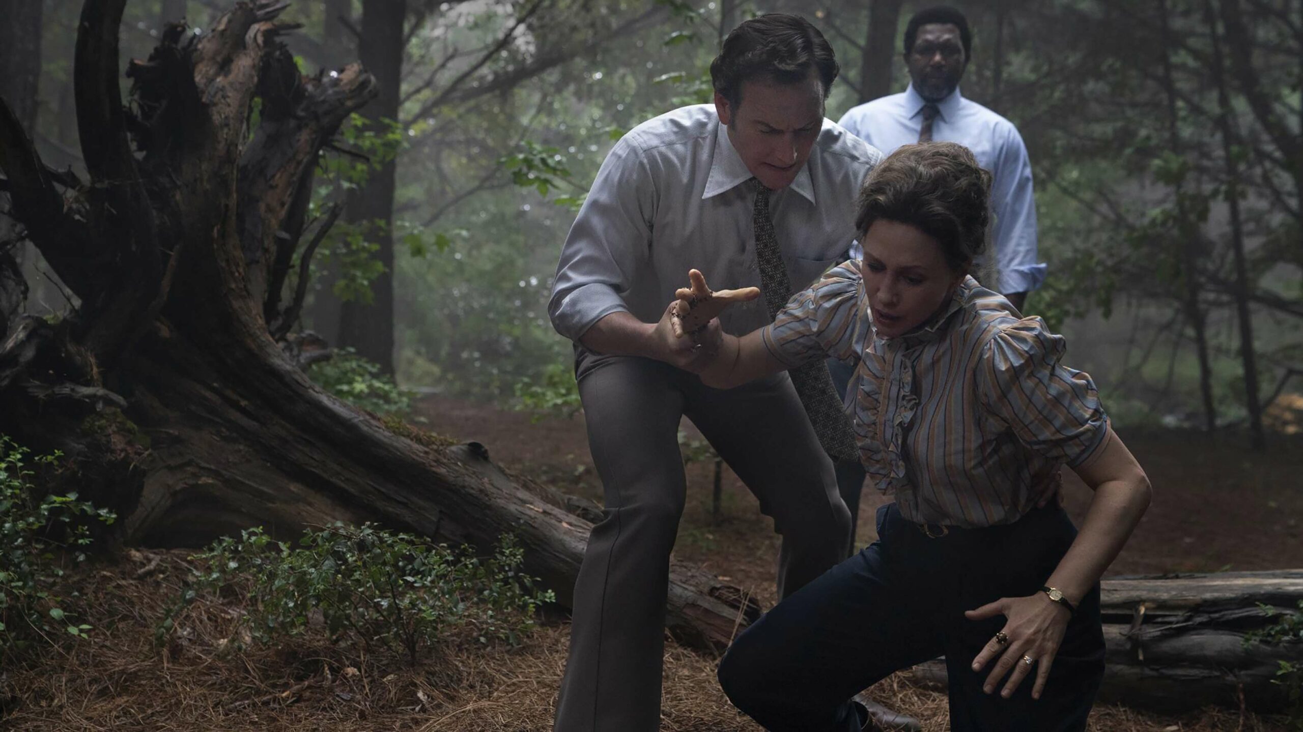 The Conjuring: The Devil Made Me Do It Ed and Lorraine Wilson in forest